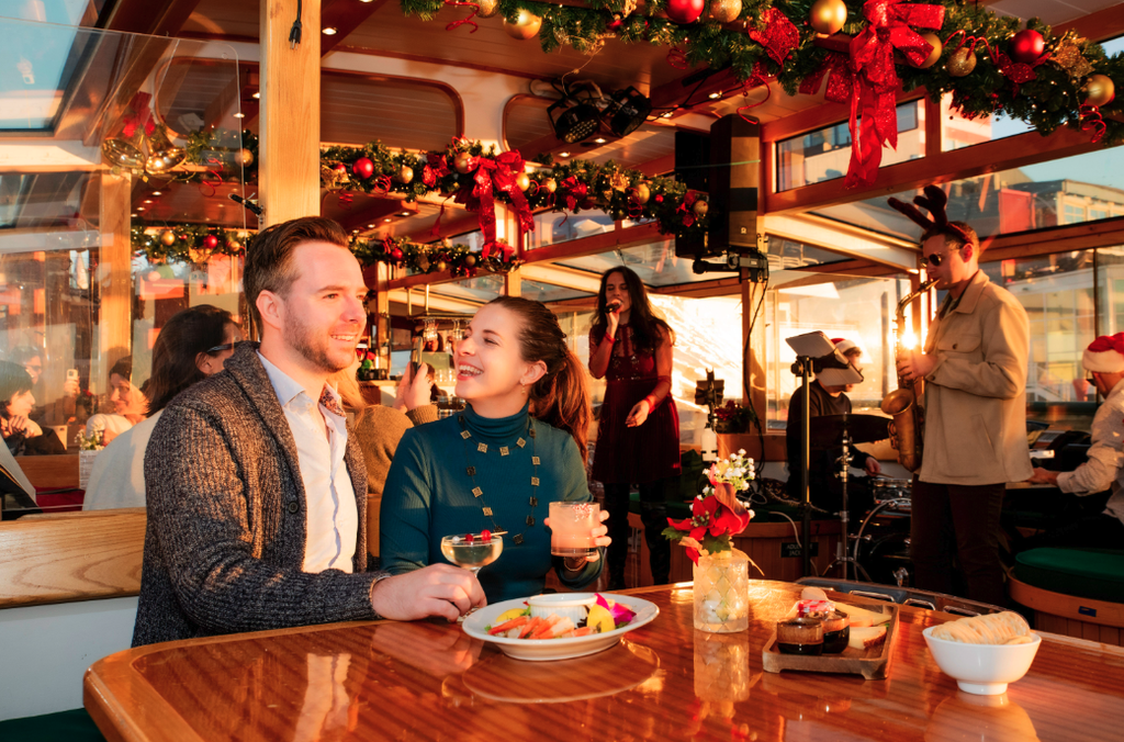 Couple on a holiday decorated boat